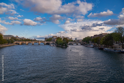 Panoramic View of Pont Neuf and Cite Island from Pont des Arts at Sunset - Paris, France - Iconic Bridge, the Oldest in the City photo