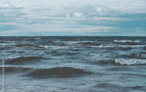 View of Tallinn from Pirita across the sea. Cold north sea, waves, city in the distance. cold shade.