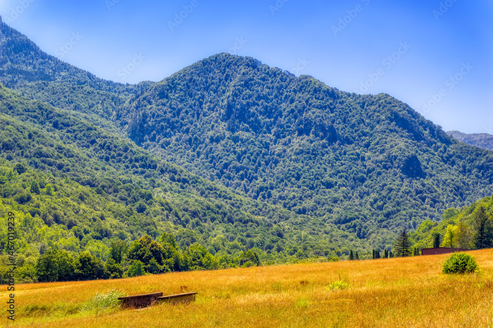 Natural mountain landscape during sunny summer day.