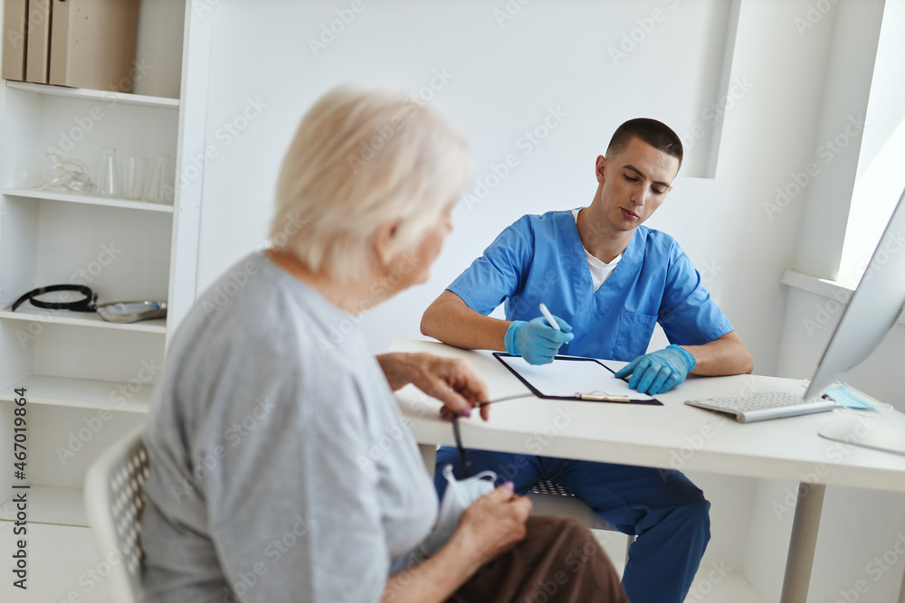 elderly woman at the doctor's appointment health care elderly woman at the doctor's appointment health care