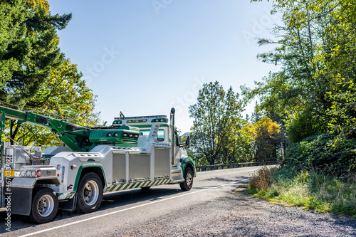 Wallpaper Mural Mobile Road assistant towing truck with the crane jib raised tow broken truck running on the narrow road Torontodigital.ca