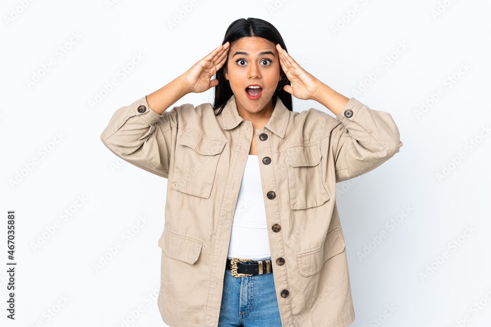 Young latin woman woman isolated on white background with surprise expression Young latin woman woman isolated on white background with surprise expression