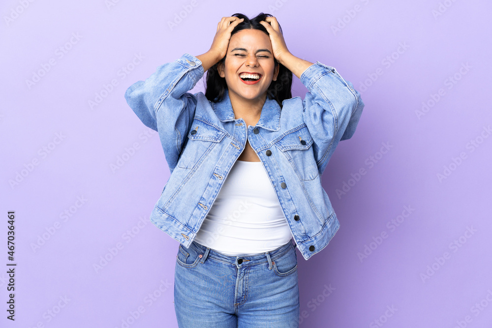Young latin woman woman over isolated background laughing Young latin woman woman over isolated background laughing