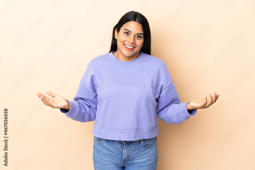 Young latin woman woman over isolated background happy and smiling Young latin woman woman over isolated background happy and smiling
