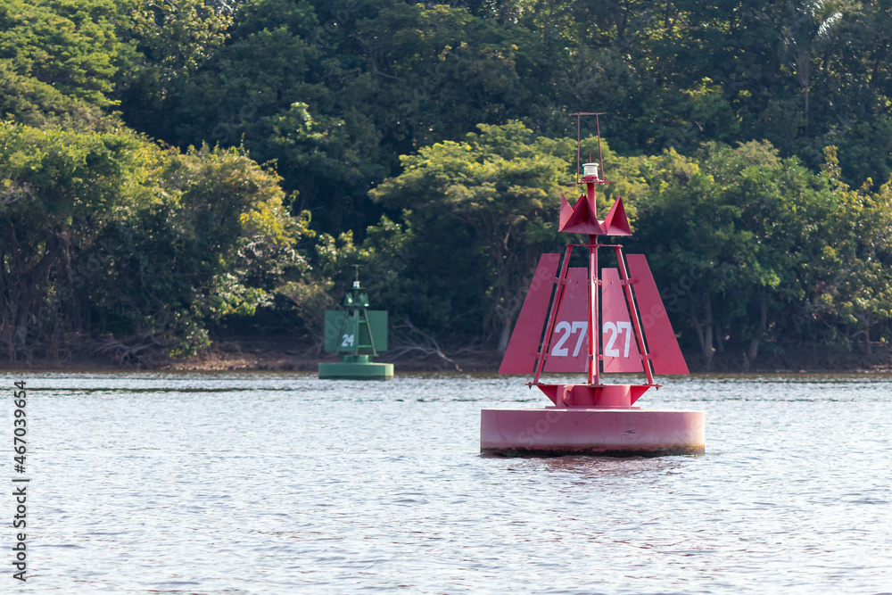 Red and green lateral buoy (port and starboard), river or sea mark used in marine piloting to