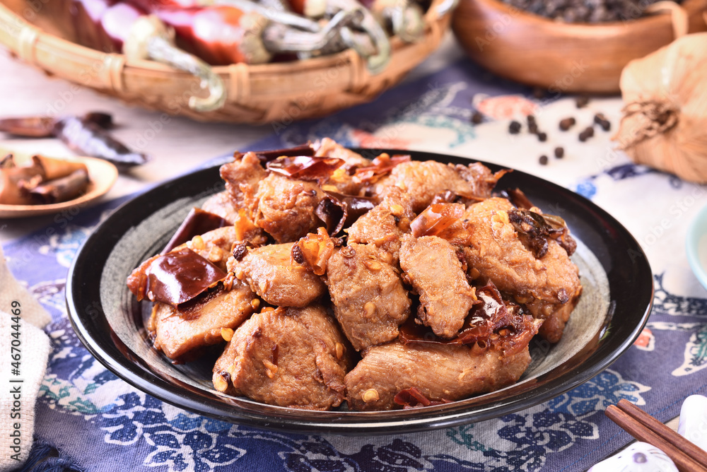 Spicy diced chicken on plate Spicy diced chicken on plate