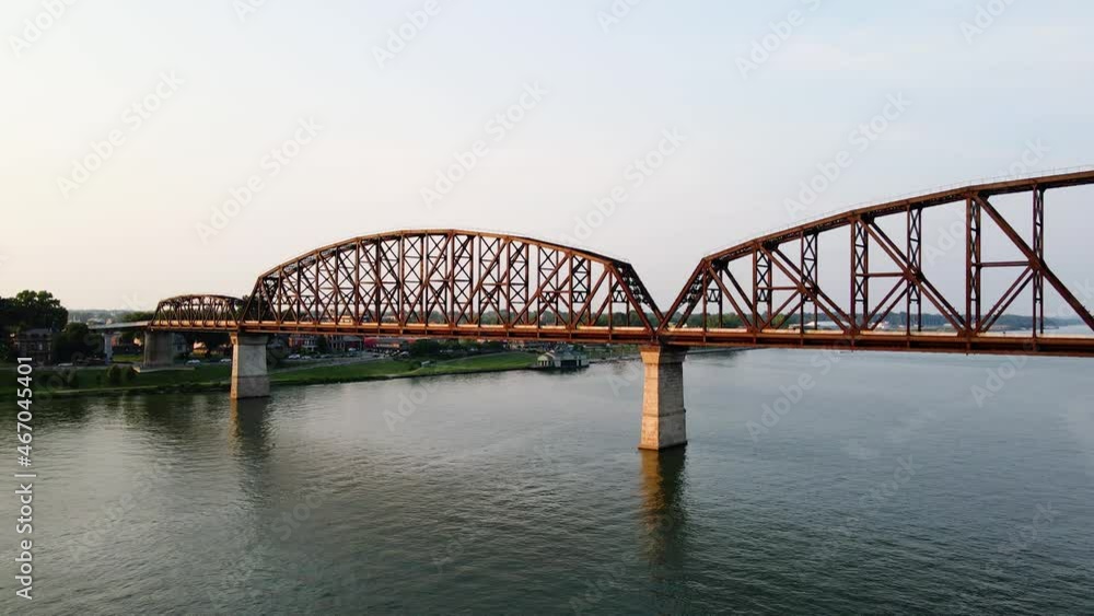 Aerial view close to the Big Four bridge, sunset in Louisville, USA - pan, drone shot Aerial view close to the Big Four bridge, sunset in Louisville, USA - pan, drone shot