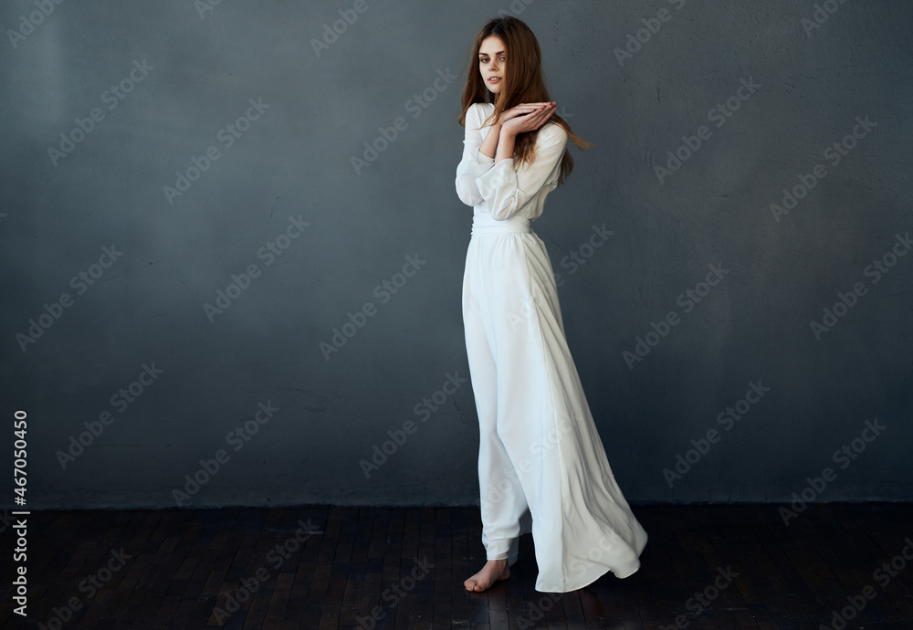 Woman in white dress charm basing fashion hairstyle performance Woman in white dress charm basing fashion hairstyle performance