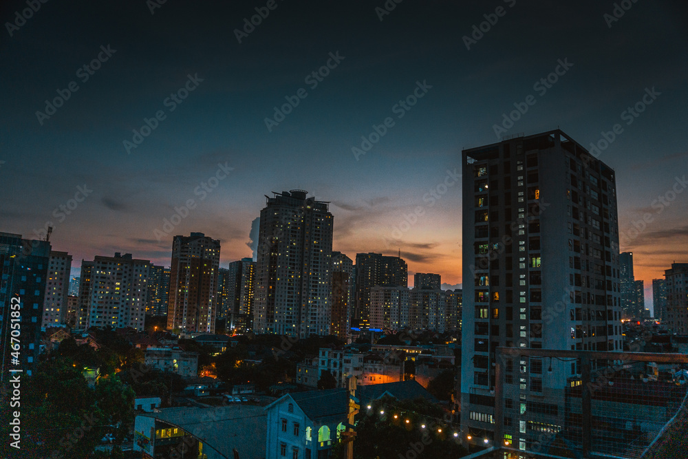 Aerial view of office buildings in Hanoi, a central business district in Vietnam. Beautiful sunset in the urban cityscape.