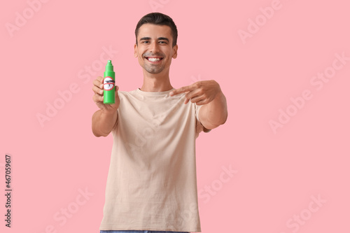 Young man with mosquito rep...