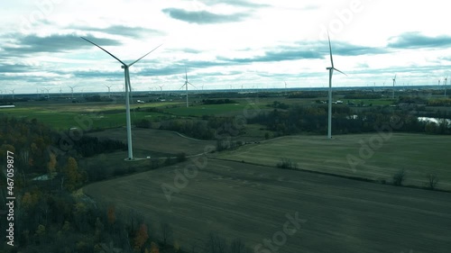 Matrix color edit on imposing windmills. A source of controversy in rural Michigan communities including Weidman, Michigan. photo