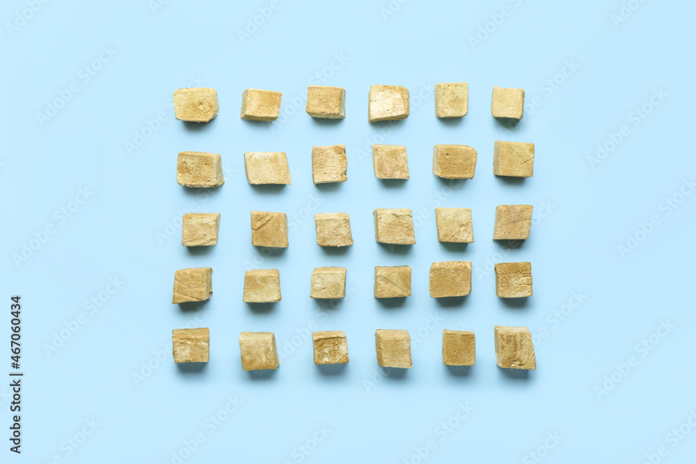 Tasty hojicha marshmallows on blue background Tasty hojicha marshmallows on blue background