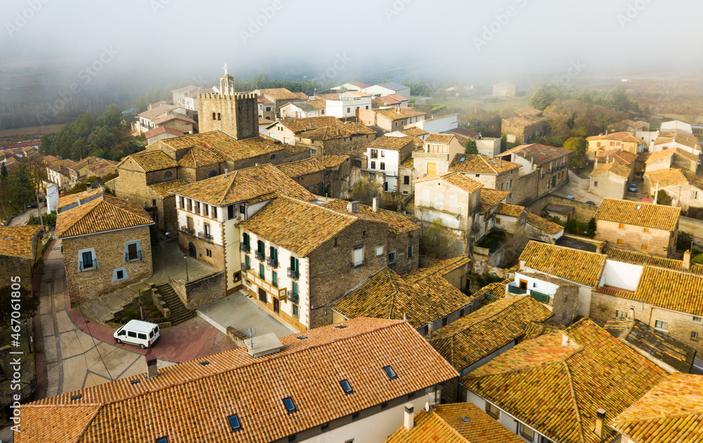 Smallish Spanish city of Liedena as seen from drone in autumn day, Navarre ..