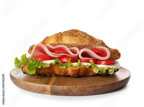 Plate with delicious croissant sandwich on white background