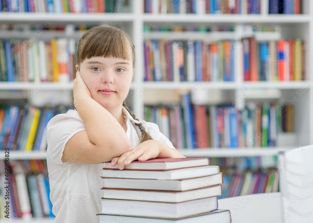 Portrait of a young girl with special needs at library Portrait of a young girl with special needs at library