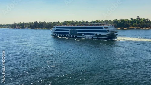 Wallpaper Mural Large touristic cruise navigating through the waters of Nile river in Egypt. Concepts of travel and tourism industry in Egypt. Torontodigital.ca