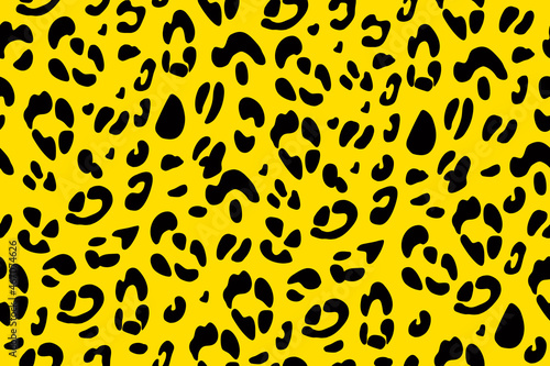 Yellow leopard seamless pattern. Animalistic print. Vector hand-drawn background