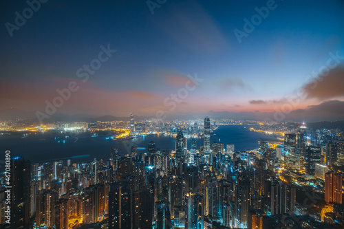 Hong Kong city with Victoria Harbor view from peak at dawn 