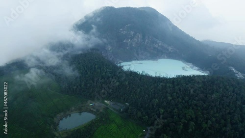 White crater with mount Patuha surrounded mist photo