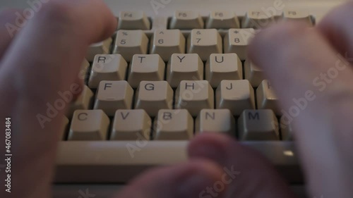 Close Up Shooting with a Keyboard and a Computer Programmer Typing a Code Line on Pc. Hands Writing a Message on Pc Keyboard.