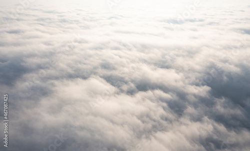Fototapeta Naklejka Na Ścianę i Meble -  Aerial top view white clouds. View from drone. Aerial top view cloudscape. Texture of clouds. View from above. Panorama sky