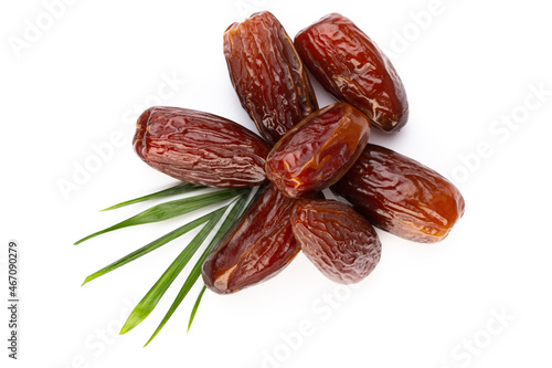 Dry dates isolated on white background. Top view. Flat lay pattern.