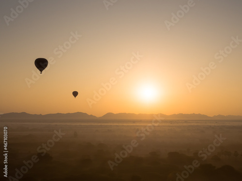 Myanmar - Bagan - Two balloons floating over Bagan
