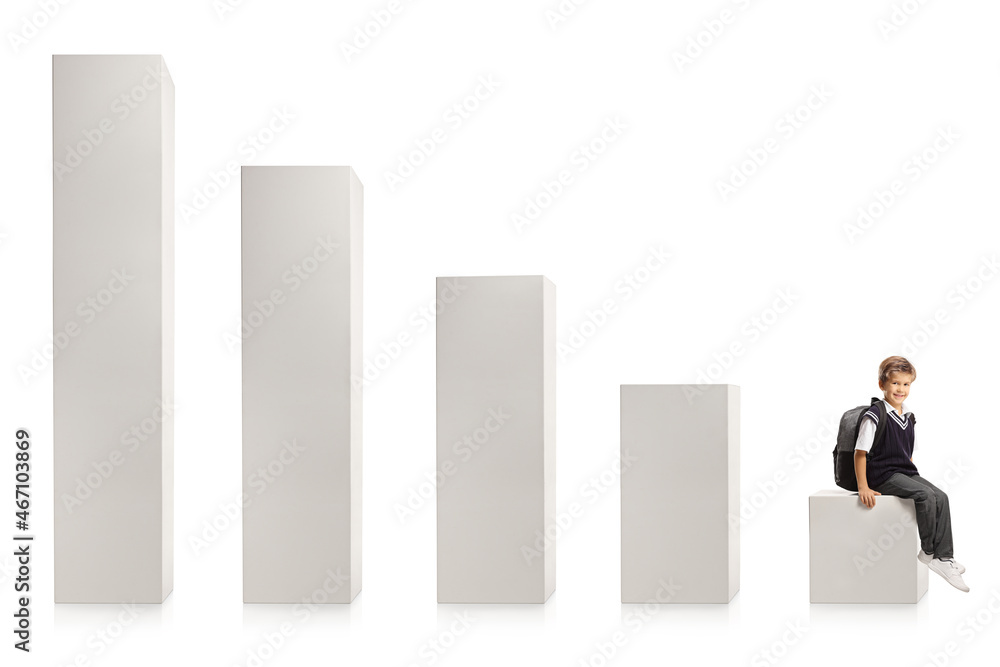 Schoolboy in a uniform sitting on a column from a diagram Schoolboy in a uniform sitting on a column from a diagram