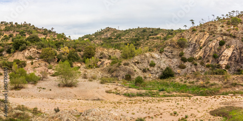 Fotografija rocky hills in in Mediterranean scrubland