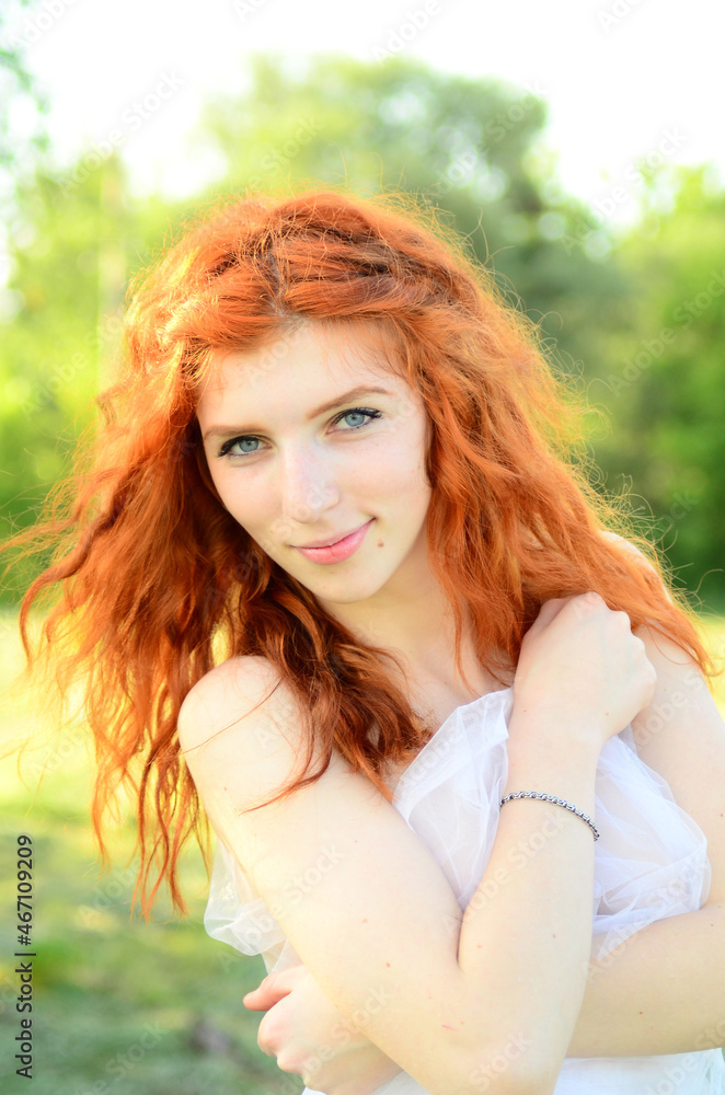 Naklejka premium A young beautiful ore girl of the Caucasian appearance is having fun with pineapple. Place for text.Vegan, vegetarianism, healthy lifestyle, positive concept