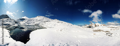 First snow on dolomites,  walking on altopiano della rosetta photo