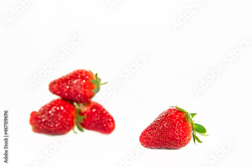 freshly picked organic strawberry isolated over white background, healthy eating. 