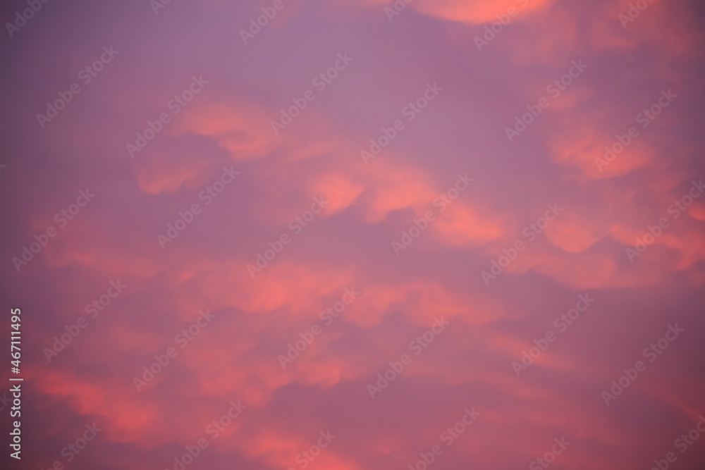 Abstract warm color cloud on blue sky in sunset time background.