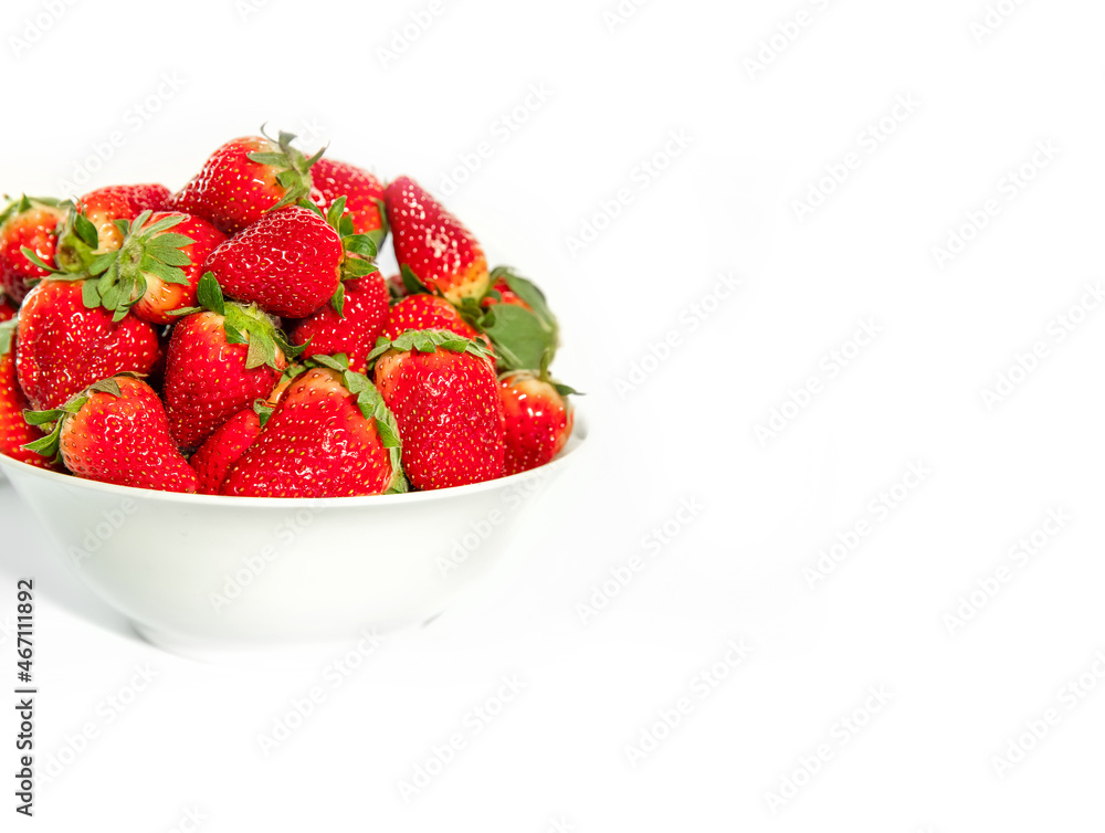 freshly picked organic strawberry isolated over white background, healthy eating. freshly picked organic strawberry isolated over white background, healthy eating.
