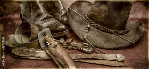 photo ancienne, bottes,chapeau,ceinture et couteau dans étui de cuir