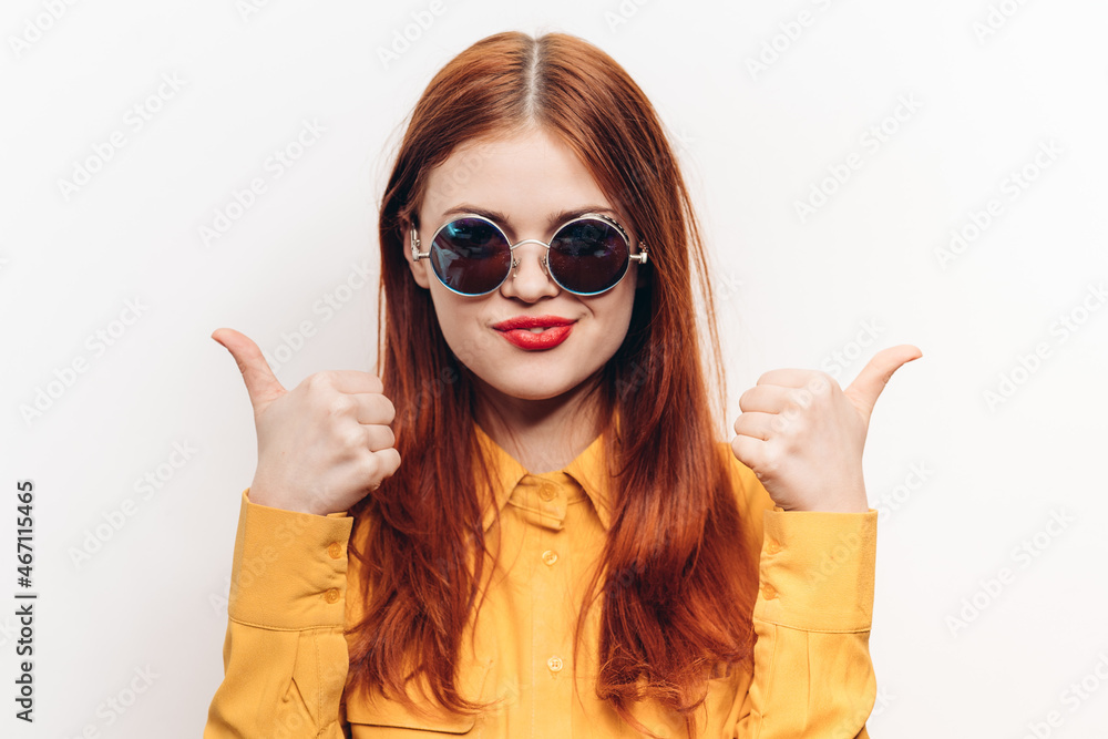 cheerful attractive woman in yellow shirt fashionable clothes sunglasses cheerful attractive woman in yellow shirt fashionable clothes sunglasses