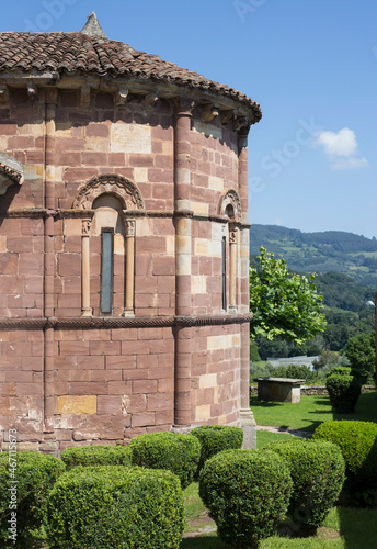 apse of the church of San Juan de Amandi, Villaviciosa, Asturias . Romanesque and pre-Romanesque of Asturias. sunny day photo