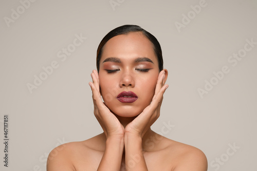 Beauty Portrait Beautiful asian Model Touching Face by Hand