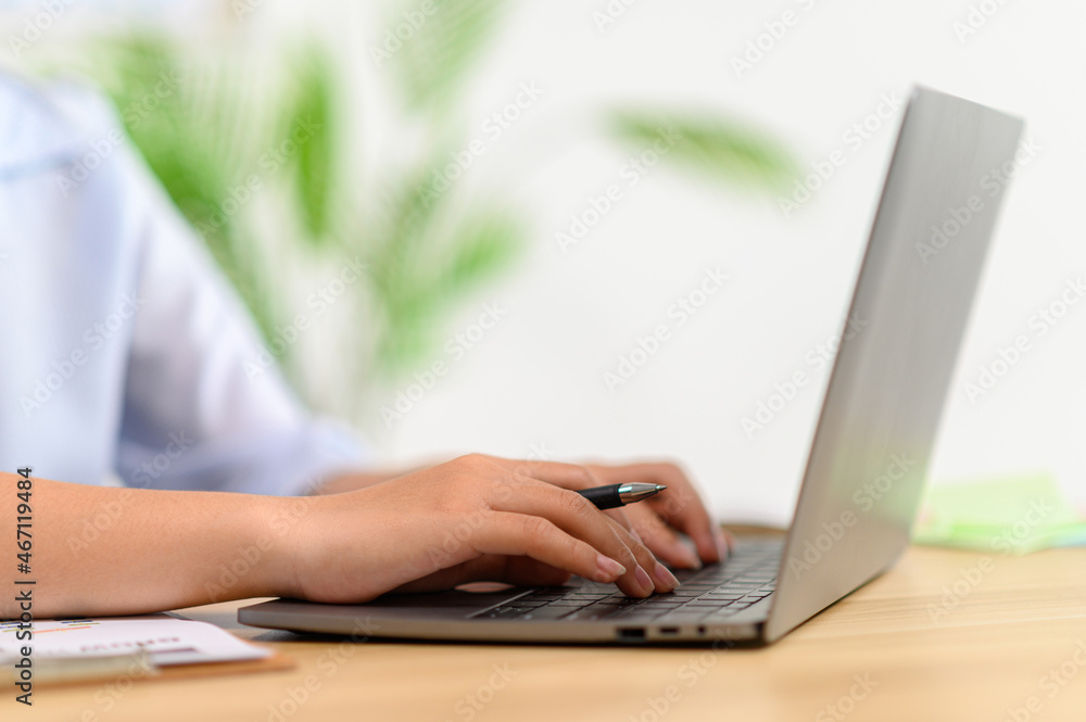 female employee working with laptop female employee working with laptop