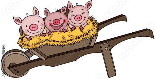 Bale of hay with three cute pigs on wooden garden cart
