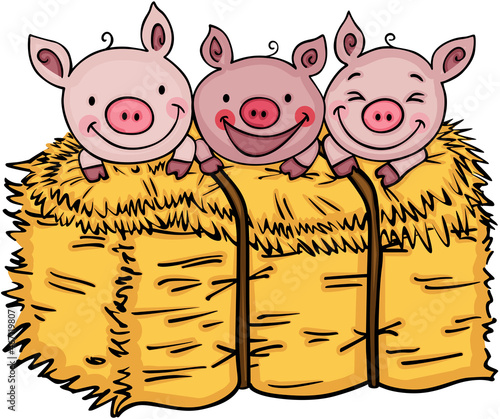 Three funny pigs on bale of hay