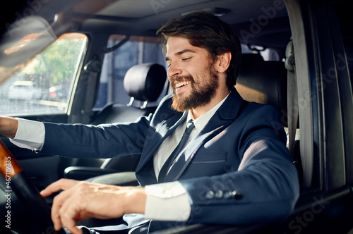 bearded man in a suit in a car a trip to work success © SHOTPRIME STUDIO