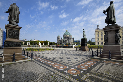 Schinkel square with statues, Schloss bridge and Berliner Dom behind, Unter den Linden, Berlin, Germany photo