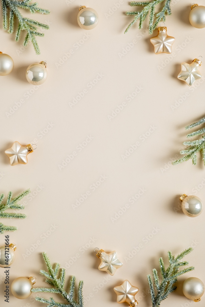 Beige vertical Christmas background with golden balls, stars, fir ...