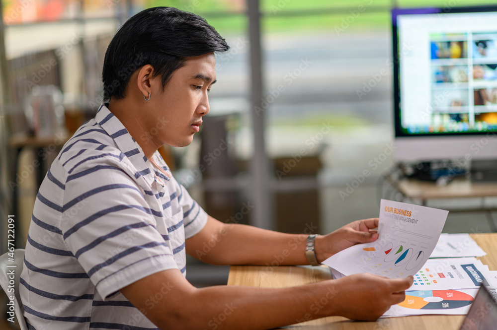 Employee holding documents and stressing Employee holding documents and stressing