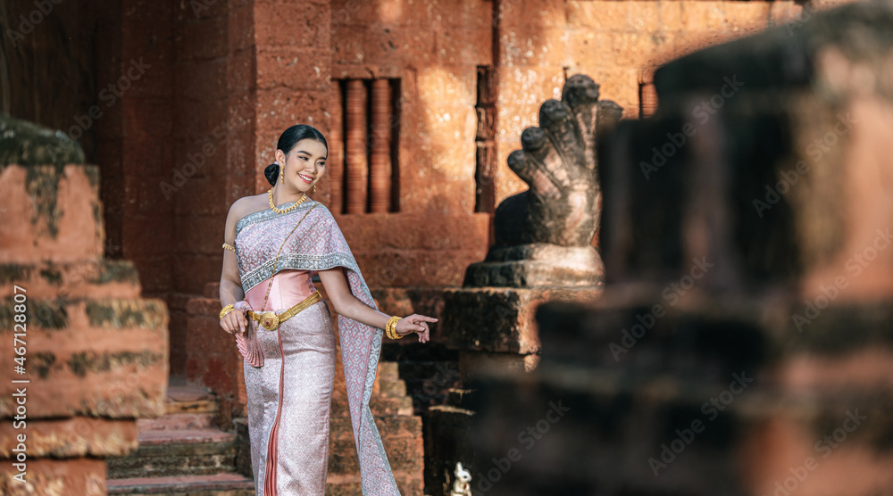 Asian charming woman wearing typical Thai dress identity culture