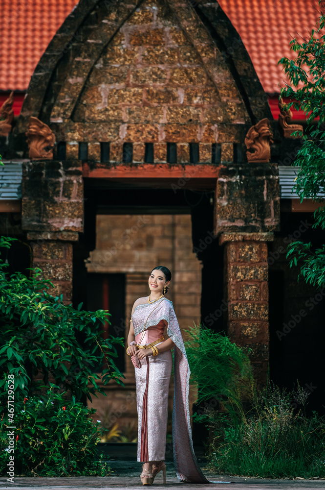 Asian charming woman wearing typical Thai dress identity culture