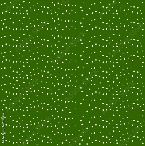 green background with white dots 