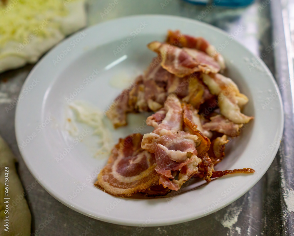 cooked bacon to decorate a pizza cooked bacon to decorate a pizza