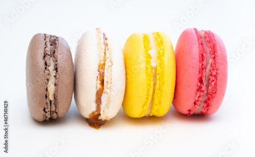 Colorful macaroons or cakes with a sweet topping